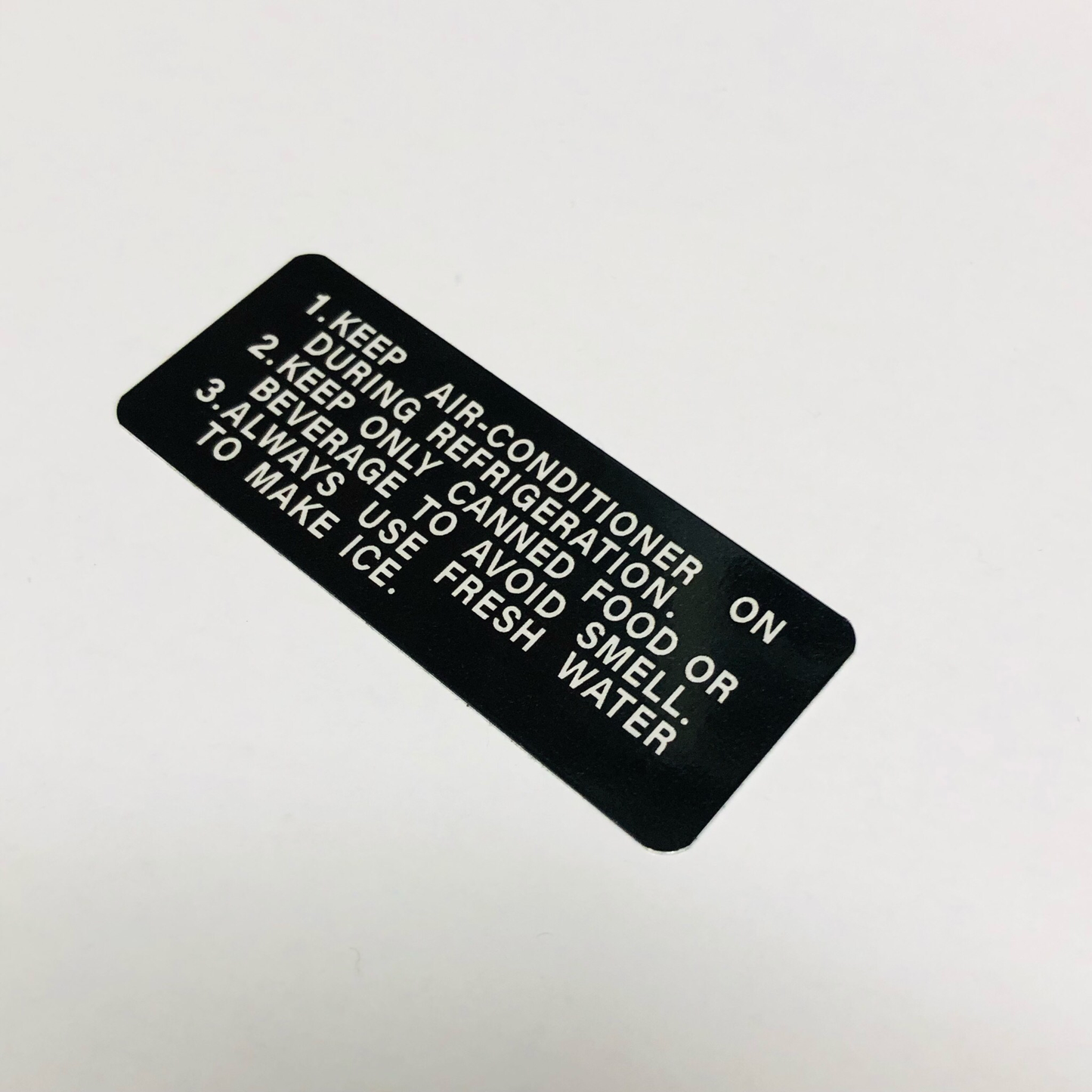 ICE MAKER CAUTION PLATE (VERSION 2)  : 60-SERIES LANDCRUISER